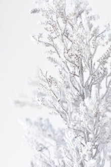 Faux snowy branches with glitter finish for winter home décor