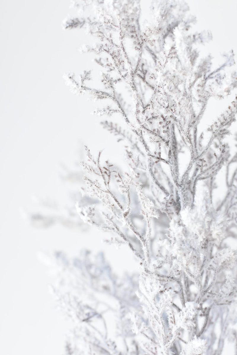 Faux snowy branches with glitter finish for winter home décor
