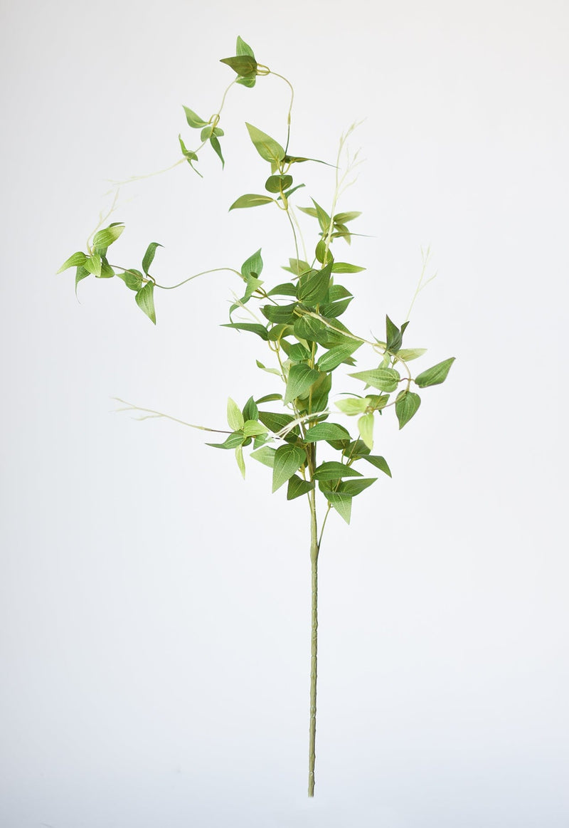 Artificial clematis vine greenery for tall vases