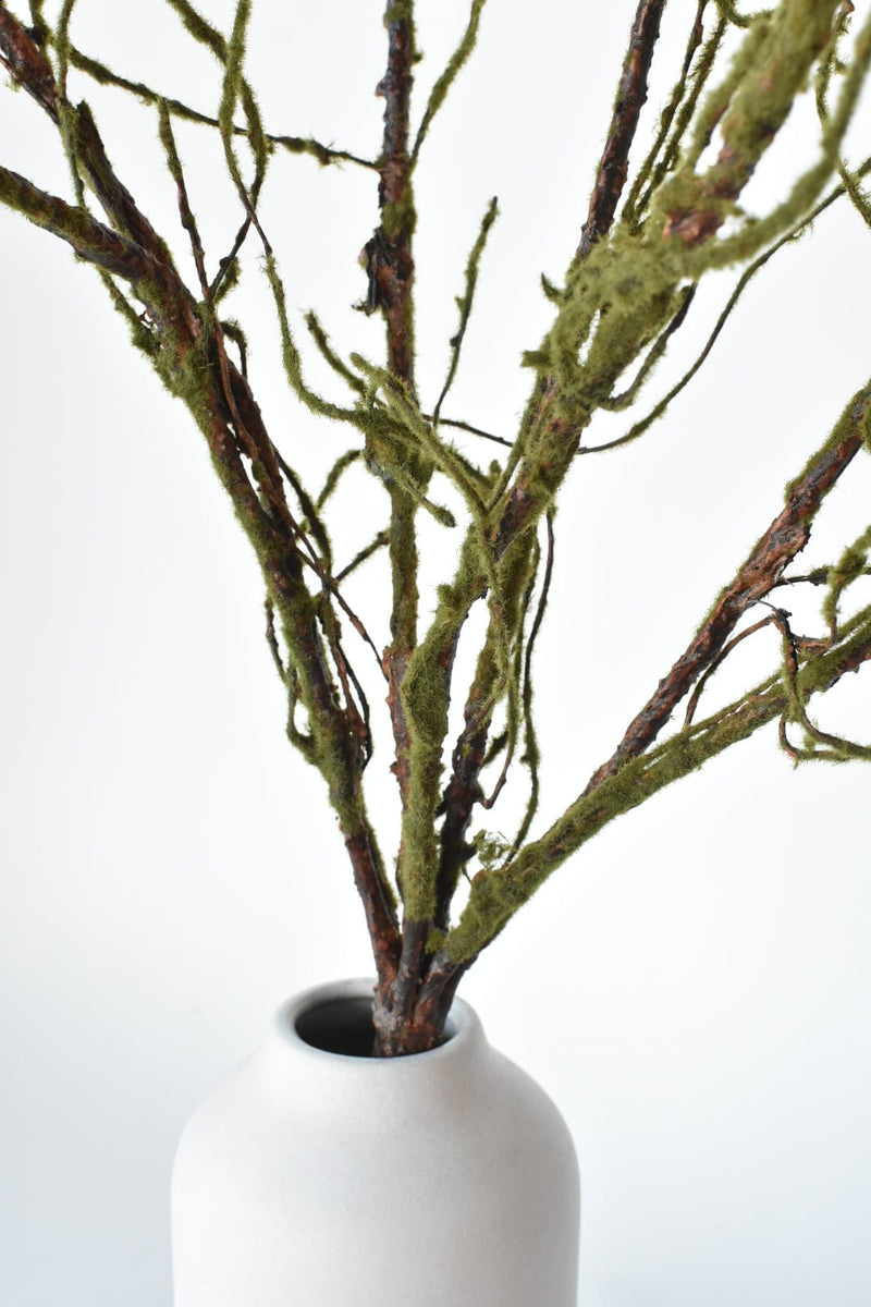 Artificial moss branch with realistic twig texture