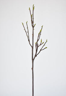 Artificial magnolia tree stem for floral arrangements