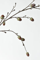 Artificial twiggy branch with realistic acorns