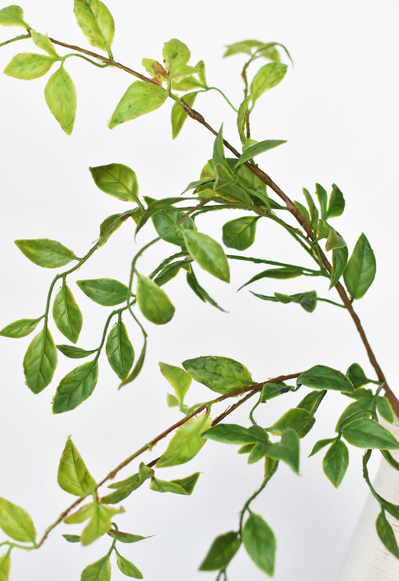 Artificial nandina greenery branch with green and rust accents