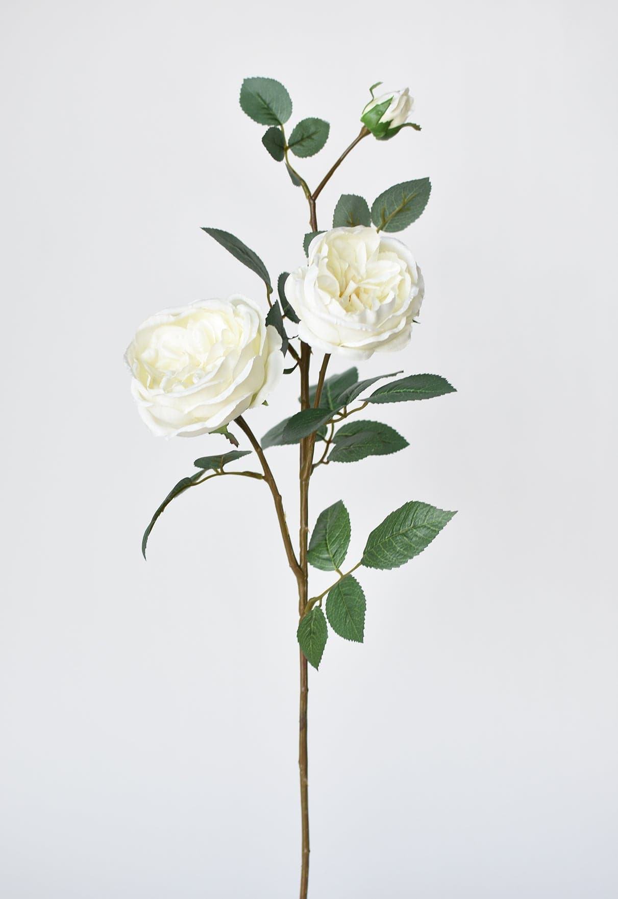 Artificial white cabbage rose branch with lush green leaves