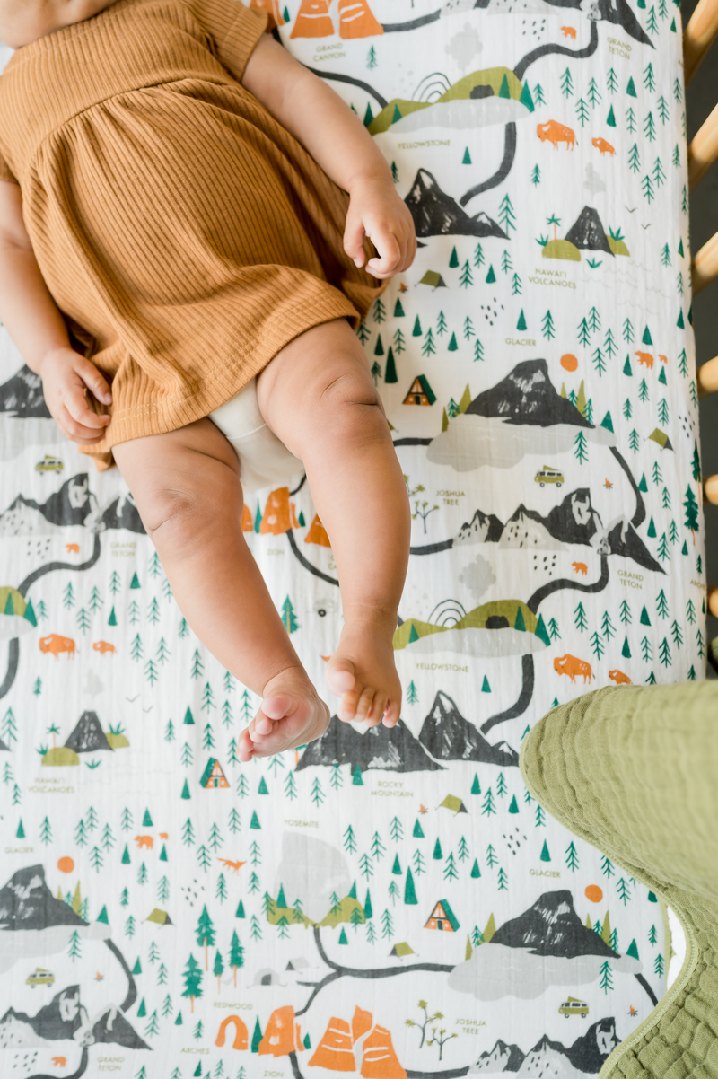 Cotton muslin crib sheet featuring Yellowstone and Yosemite designs