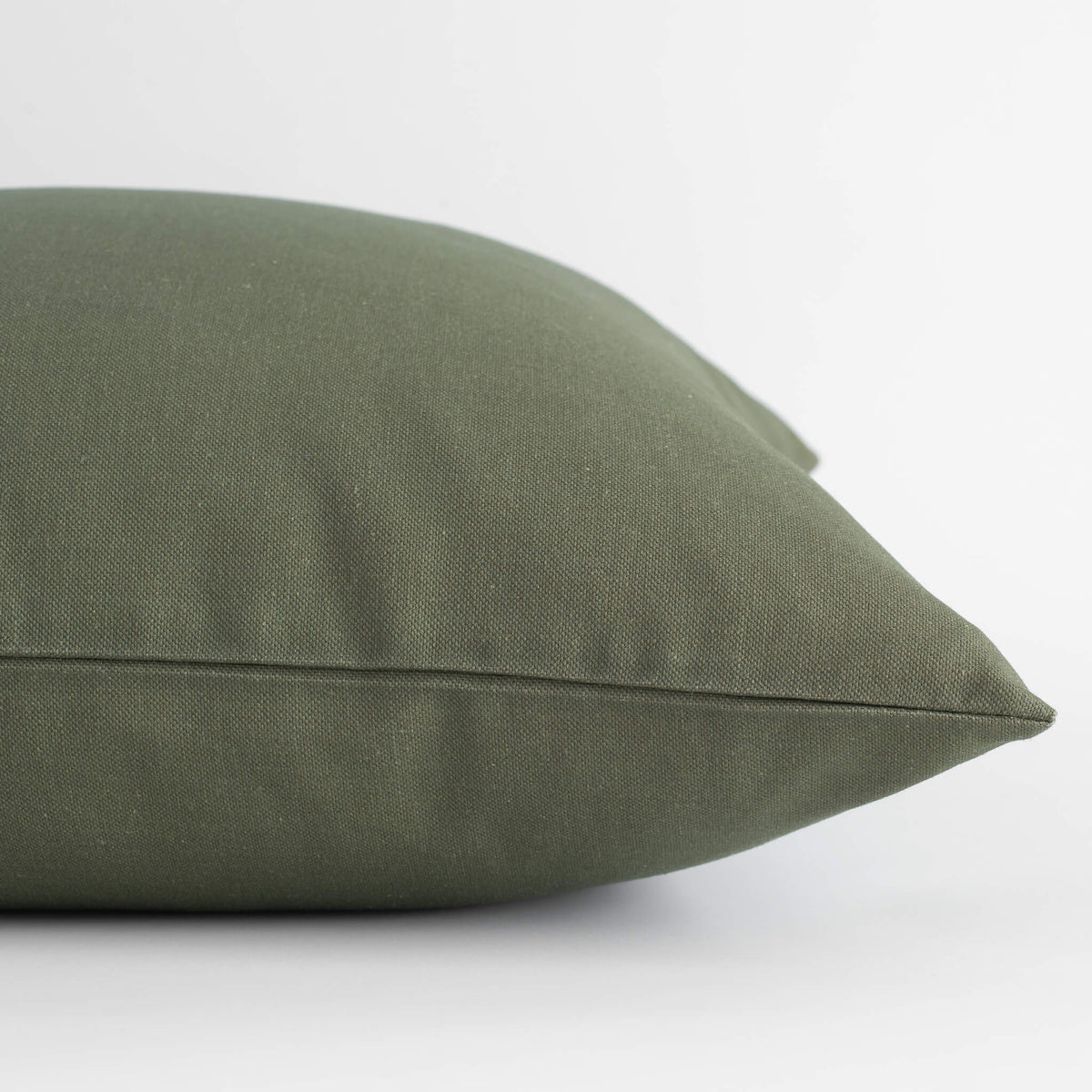 Leme olive green solid pillow cover close-up