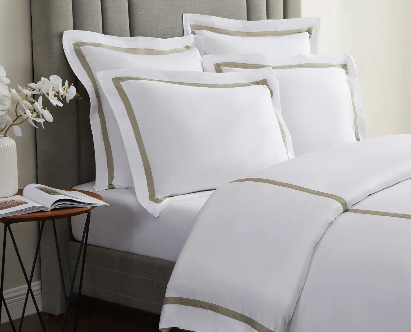 Luxury bamboo duvet cover with border detail folded on bed