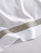 Close-up of bamboo viscose pillowcase with modern tape border