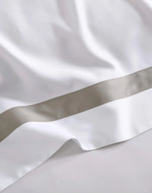 Close-up of bamboo viscose pillowcase with modern tape border