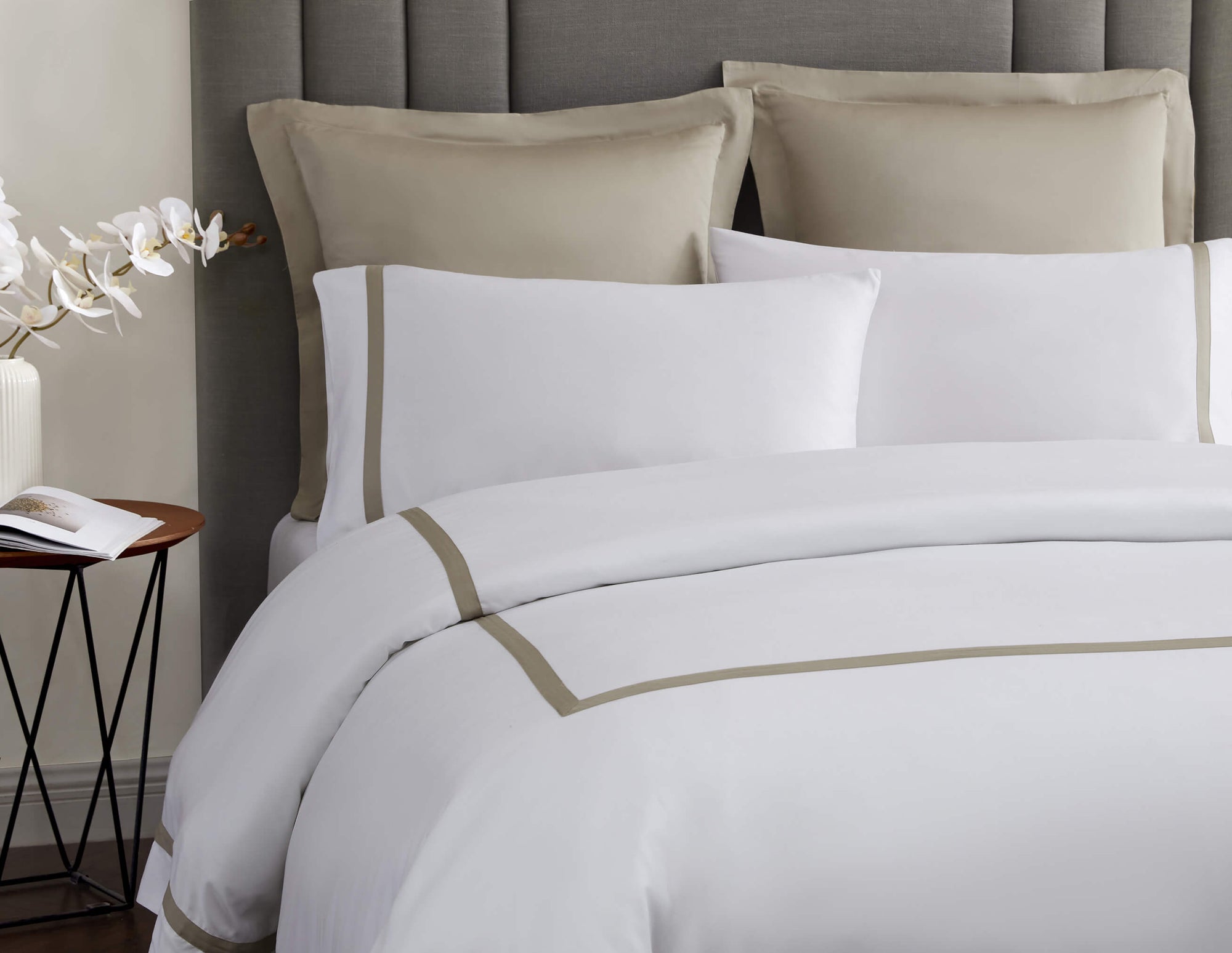 Silky bamboo pillowcases styled on bed with coordinated bedding