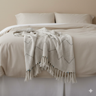 Natural chevron cotton throw styled in a living room