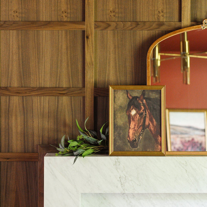 Close-up of Noble Spirit framed canvas art in a gold frame