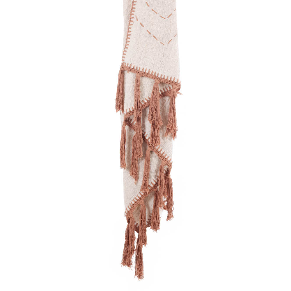 Kora natural cotton throw with terracotta stitching and tassels