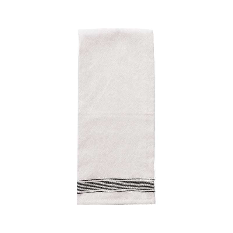 Cream cotton tea towel with three black stripes hanging on hook