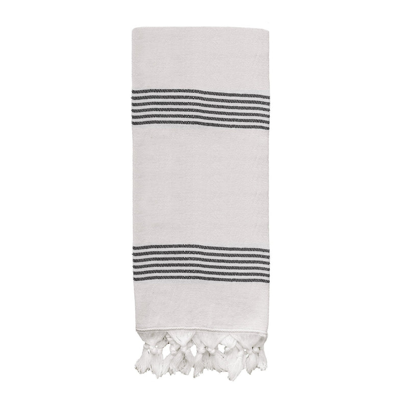 Turkish cotton + bamboo hand towel with multi black stripes draped in bathroom