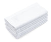 18x18 white hemstitch napkins folded on dining table