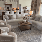 Juliette blue floral pillow in a styled living room