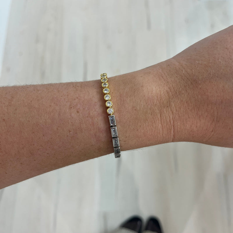 Close-up of two-tone CZ tennis bracelet with mixed cuts