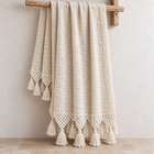 Mira natural macramé cotton throw with tassels at both ends