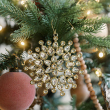 Handcrafted jeweled holiday ornaments with intricate detailing