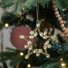 Elegant jeweled Christmas ornaments with festive light-catching design