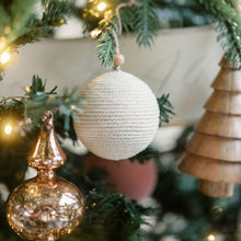 Rustic eco-friendly holiday ornaments in natural and dark tones