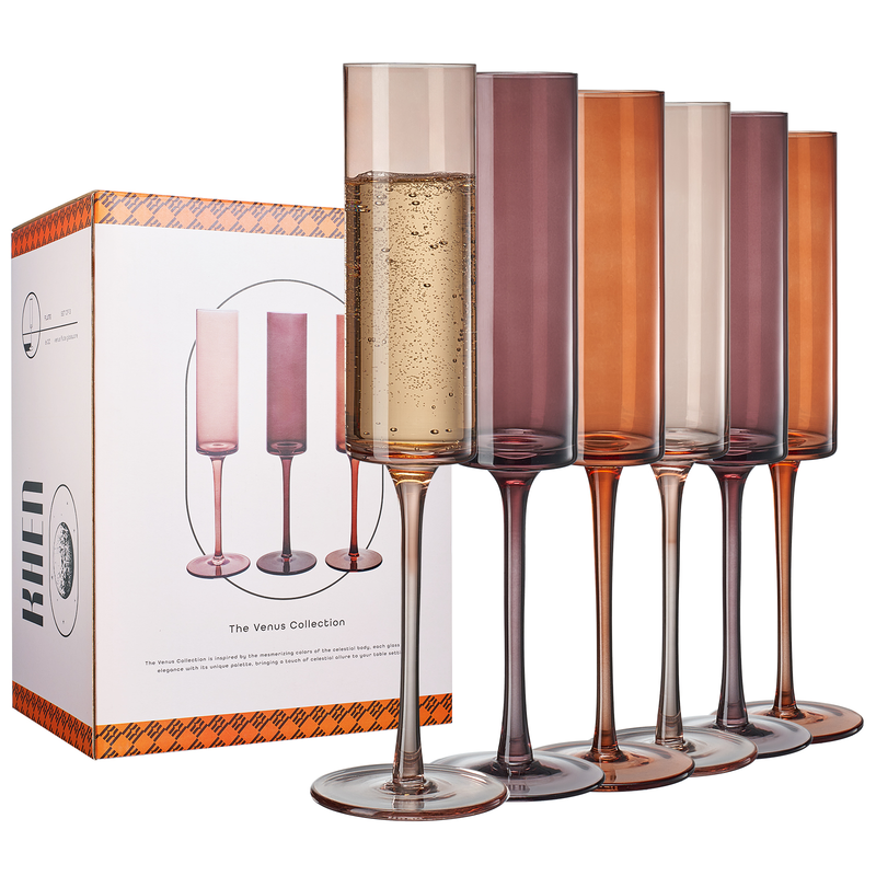 Tall, slender champagne flute filled with sparkling wine