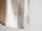 Artisan-made linen napkins in ivory and black stripes