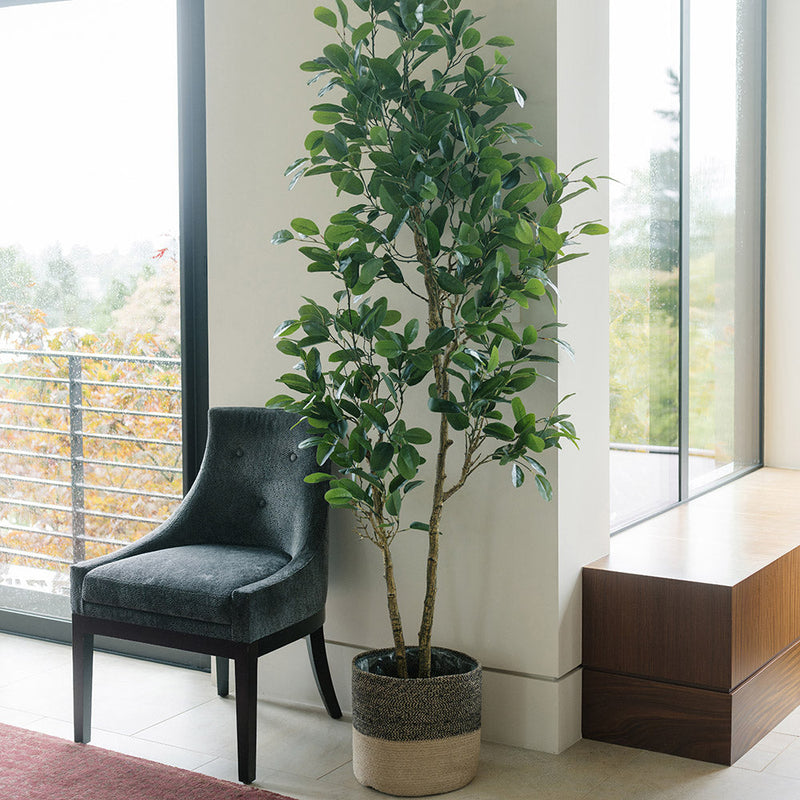 Decorative basket for faux plants and artificial trees