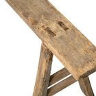Rustic wooden bench with natural imperfections
