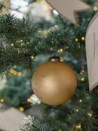 Luxury 4-inch gold holiday ornaments with satin finish