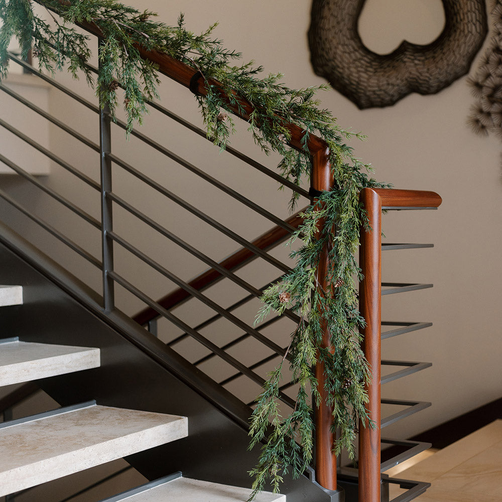 Rustic artificial pine garland with realistic pinecones