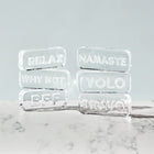 Clear glass paperweight engraved with Namaste message