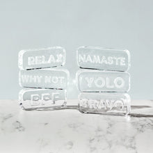 Clear glass paperweight engraved with Namaste message