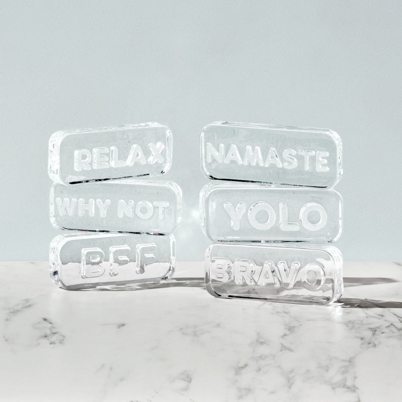 Clear glass paperweight engraved with Namaste message