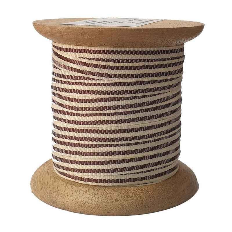 Cream and tan grosgrain ribbon on handmade wooden spools