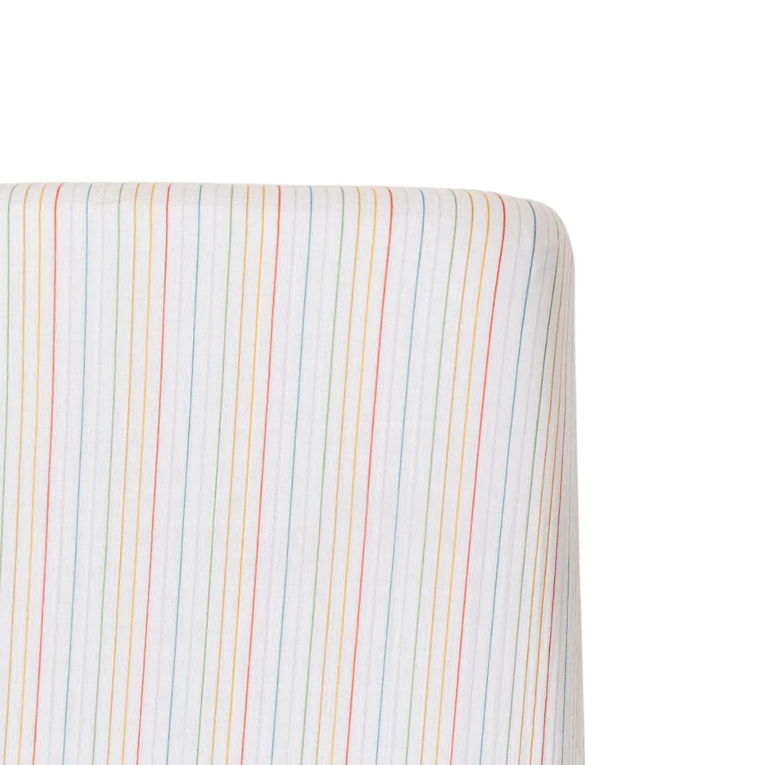 Rainbow Stripe cotton muslin crib sheet styled in nursery