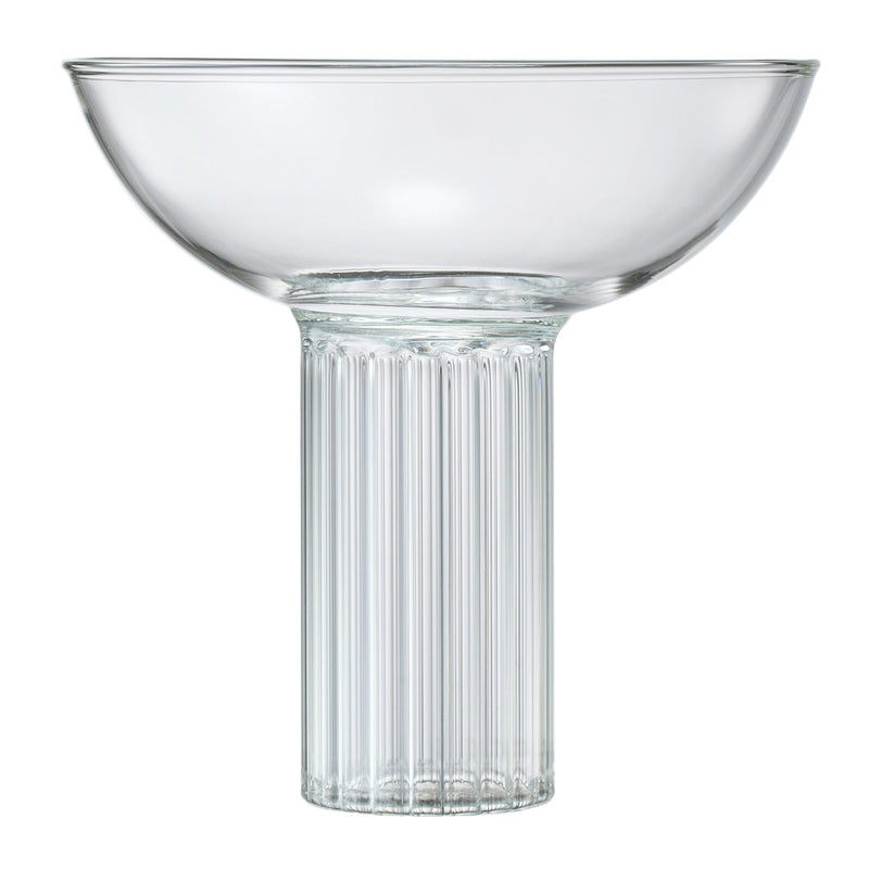Wide-bowl coupe glass filled with sparkling wine