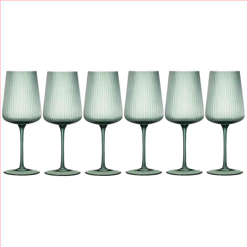 Elegant ribbed stemmed wine glasses arranged for entertaining