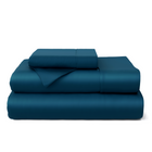 100% bamboo bed sheet set styled on bed in neutral color