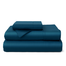100% bamboo bed sheet set styled on bed in neutral color
