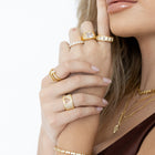 Edgy nail-inspired gold ring by Sahira Jewelry