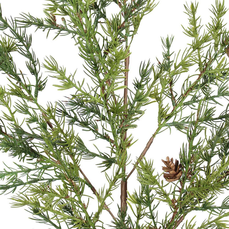 Artificial evergreen branch with natural pinecones