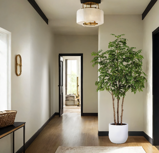 Tall faux sumac tree styled in modern entryway