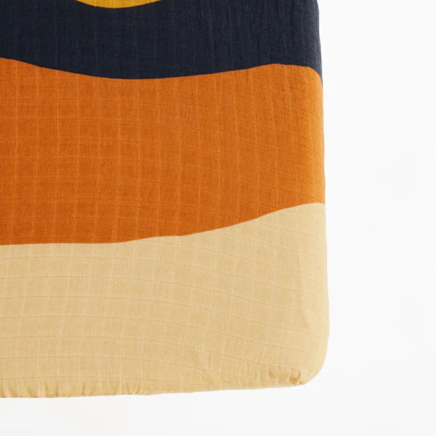 Sunset crib sheet with golden sun and mountain print