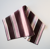 18x18 striped linen napkin styled on dining table