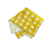Yellow linen napkin with painterly cross-hatch design