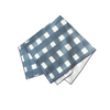 Blue Cross-Hatch linen napkins folded with lavender trim