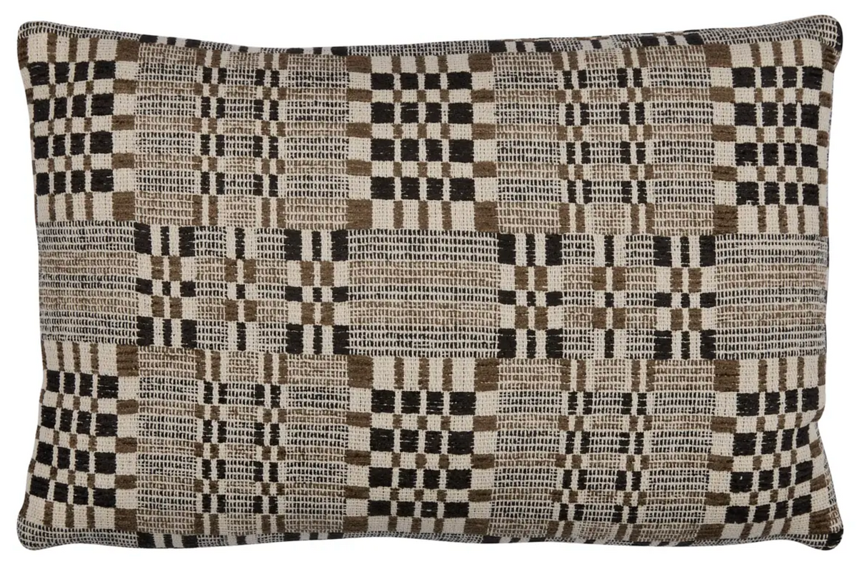 Brimfield Woven Pillow Cover in Cinder styled with cording in a living room