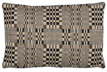 Brimfield Woven Pillow Cover in Cinder styled with cording in a living room